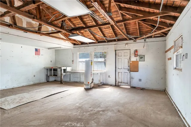a view of a room with wooden walls