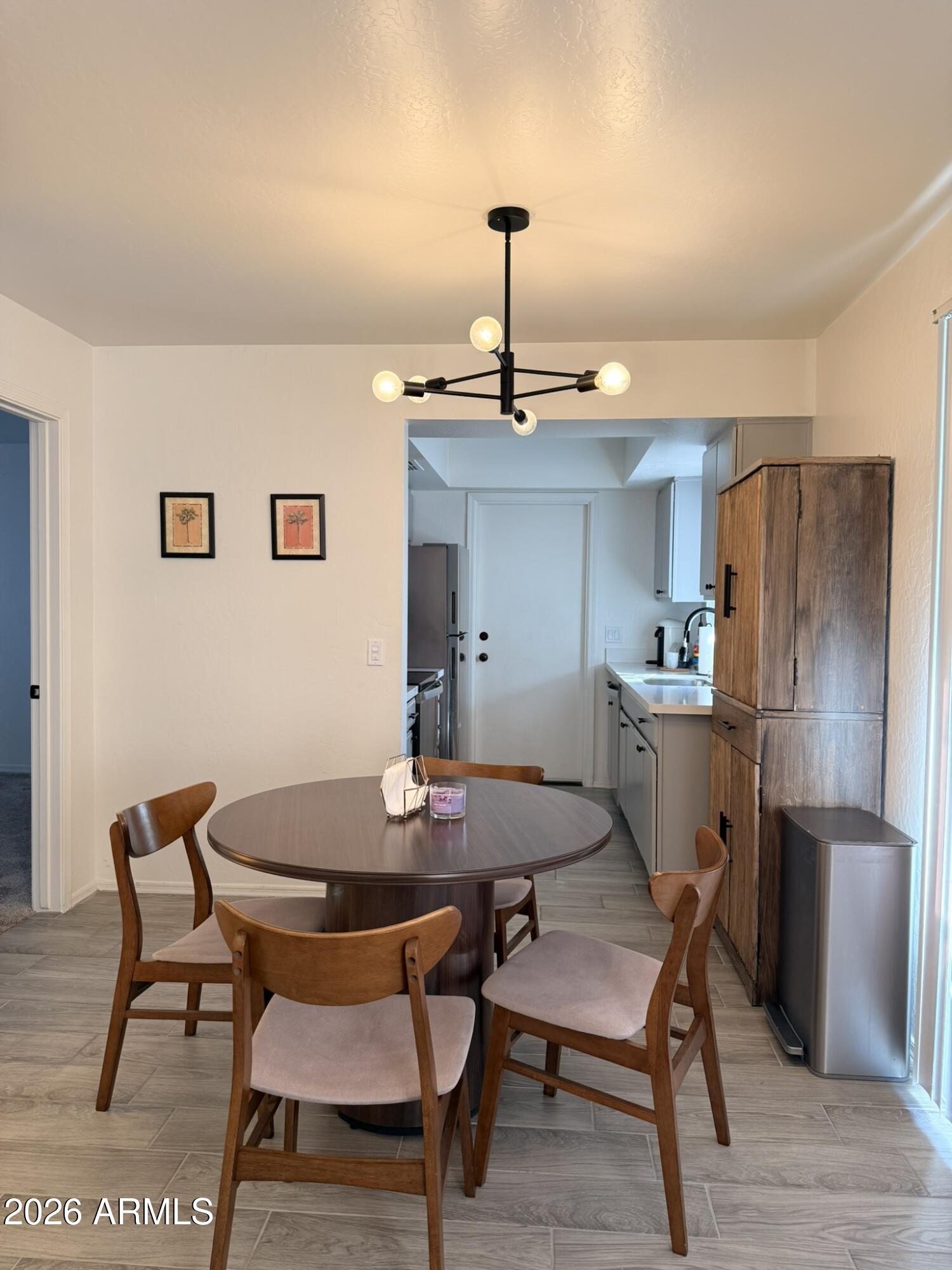 2554 West Kathleen Road Phoenix, AZ 85023 - Photo 9 of 22 a view of a dining room with furniture