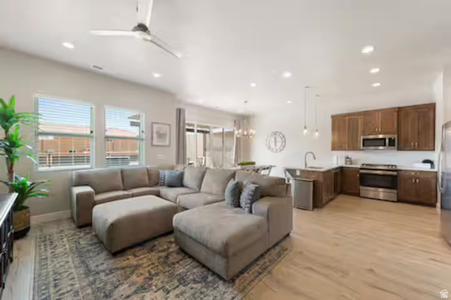 2600 Ocotillo Way, Unit 56 Santa Clara, UT 84765 - Photo 3 of 33 Living room with a chandelier, light wood-style flooring, recessed lighting, and ceiling fan