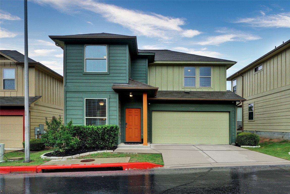 5424 Falling Leaf Lane Austin, TX 78744 - Photo 1 of 1 a front view of a house with a yard