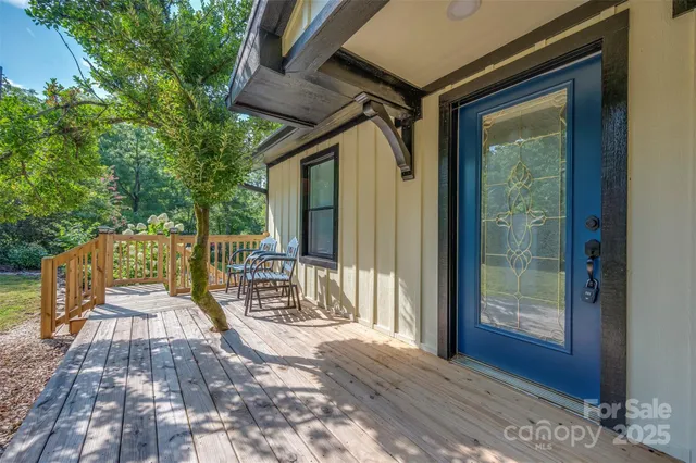 a kitchen with sink refrigerator and window