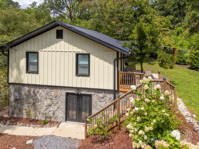 a view of a park with large trees