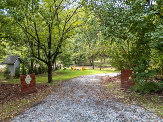 a view of a road with a yard