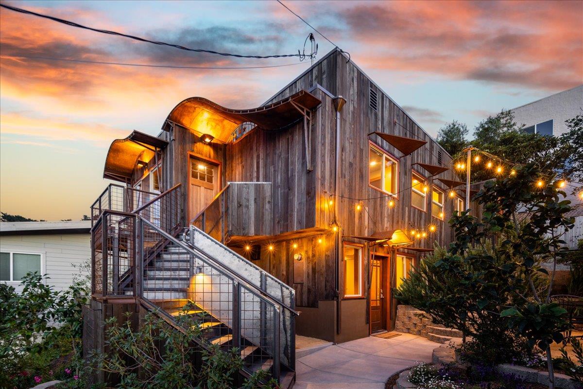 a view of a house with basketball court
