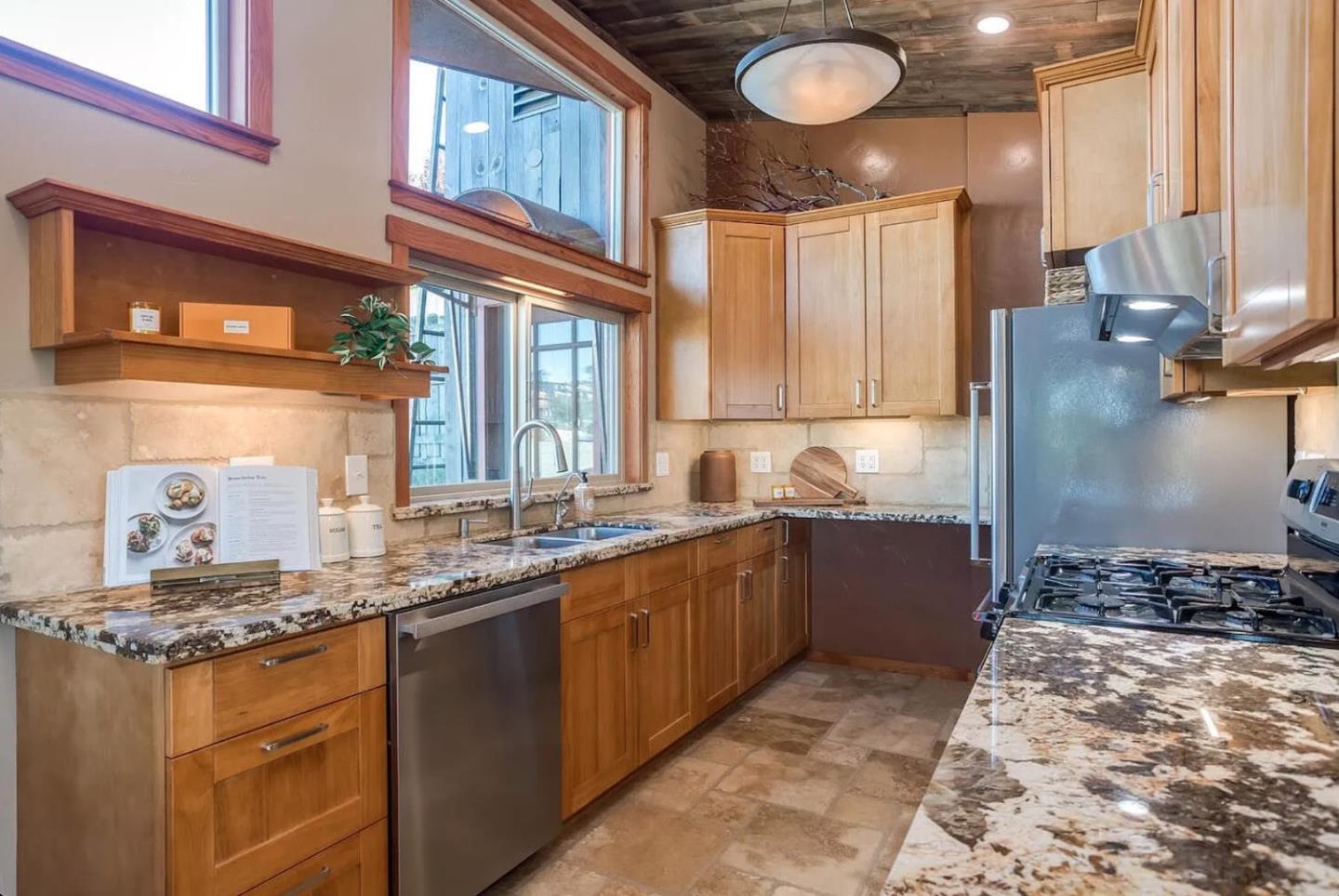 280 San Benito Road Brisbane, CA 94005 - Photo 12 of 63 a kitchen with stainless steel appliances granite countertop a stove a sink and a refrigerator
