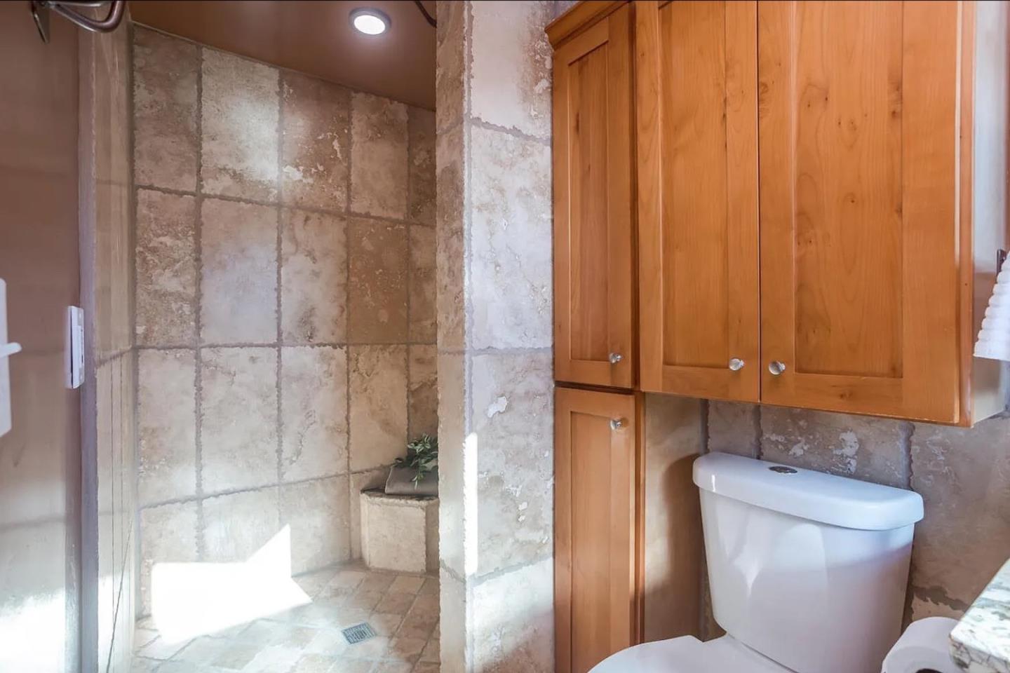 280 San Benito Road Brisbane, CA 94005 - Photo 16 of 63 a bathroom with a toilet and shower
