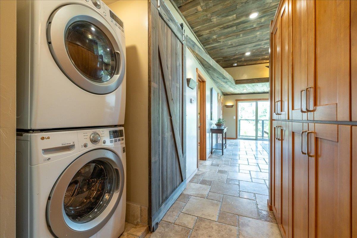 280 San Benito Road Brisbane, CA 94005 - Photo 17 of 63 a view of a hallway with washer and dryer