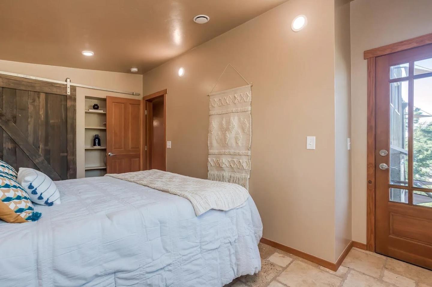 280 San Benito Road Brisbane, CA 94005 - Photo 19 of 63 a spacious bedroom with a bed and a closet