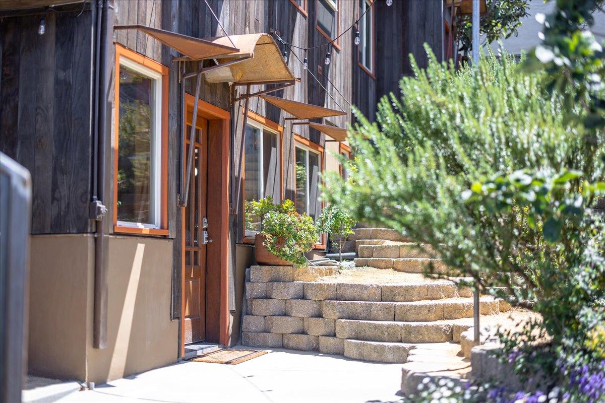 280 San Benito Road Brisbane, CA 94005 - Photo 26 of 63 a view of a house with potted plants