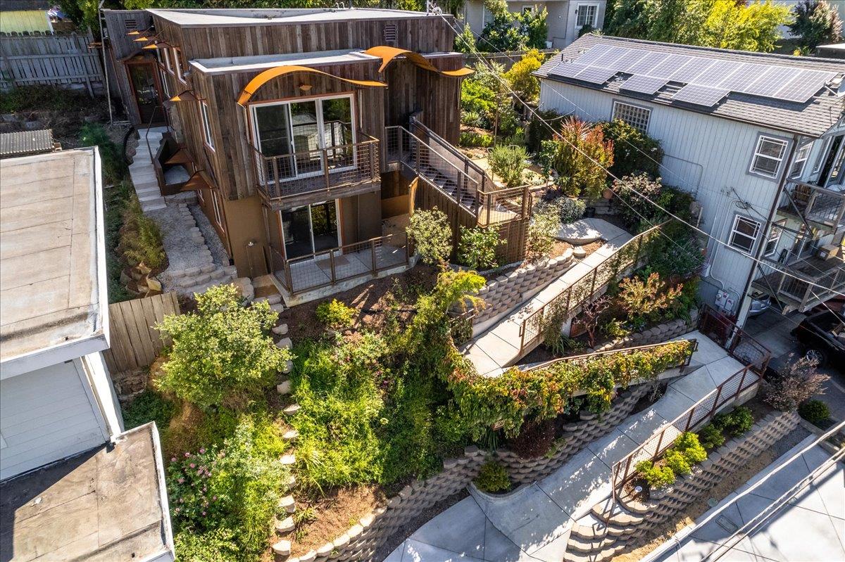 280 San Benito Road Brisbane, CA 94005 - Photo 4 of 63 an aerial view of a house with a yard