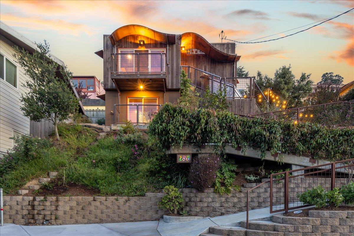 280 San Benito Road Brisbane, CA 94005 - Photo 43 of 63 a view of a building with a yard