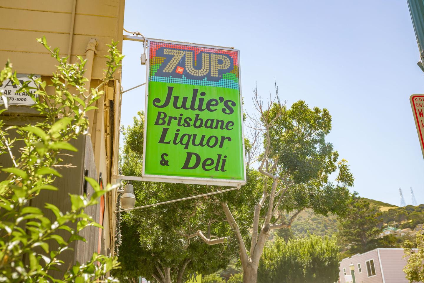 280 San Benito Road Brisbane, CA 94005 - Photo 57 of 63 a sign that is on a brick wall
