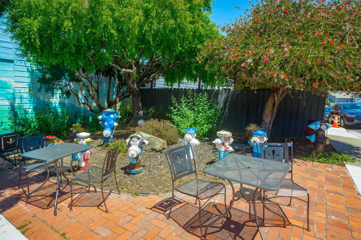 280 San Benito Road Brisbane, CA 94005 - Photo 58 of 63 a view of backyard with table and chairs couches with wooden fence and plants