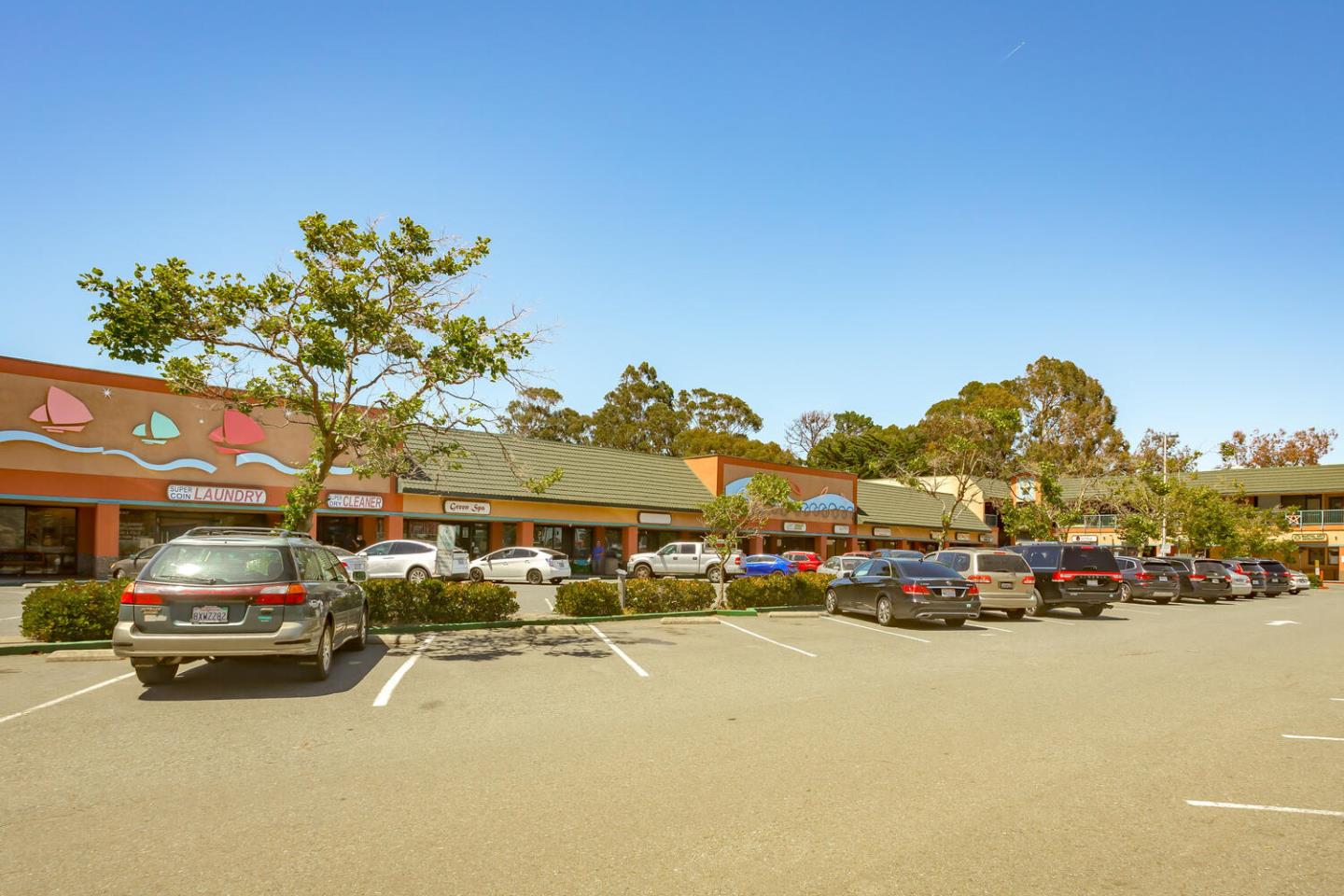 280 San Benito Road Brisbane, CA 94005 - Photo 62 of 63 a car parked in front of a building