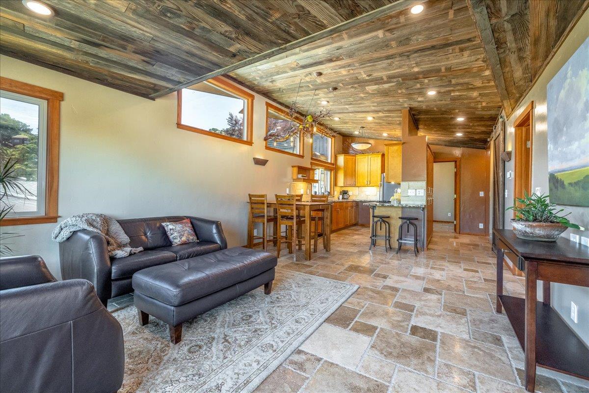 280 San Benito Road Brisbane, CA 94005 - Photo 7 of 63 a living room with lots of furniture and large windows