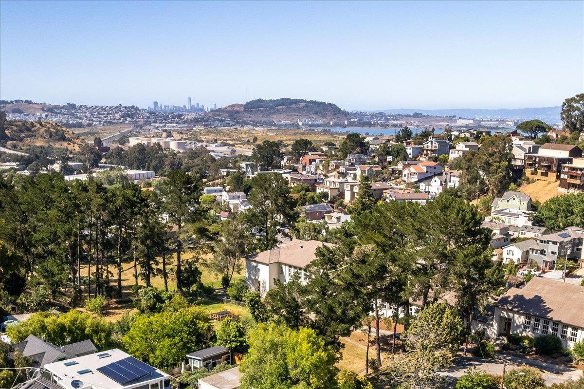 280 San Benito Road Brisbane, CA 94005 - Photo 10 of 63 an aerial view of residential houses with outdoor space and trees