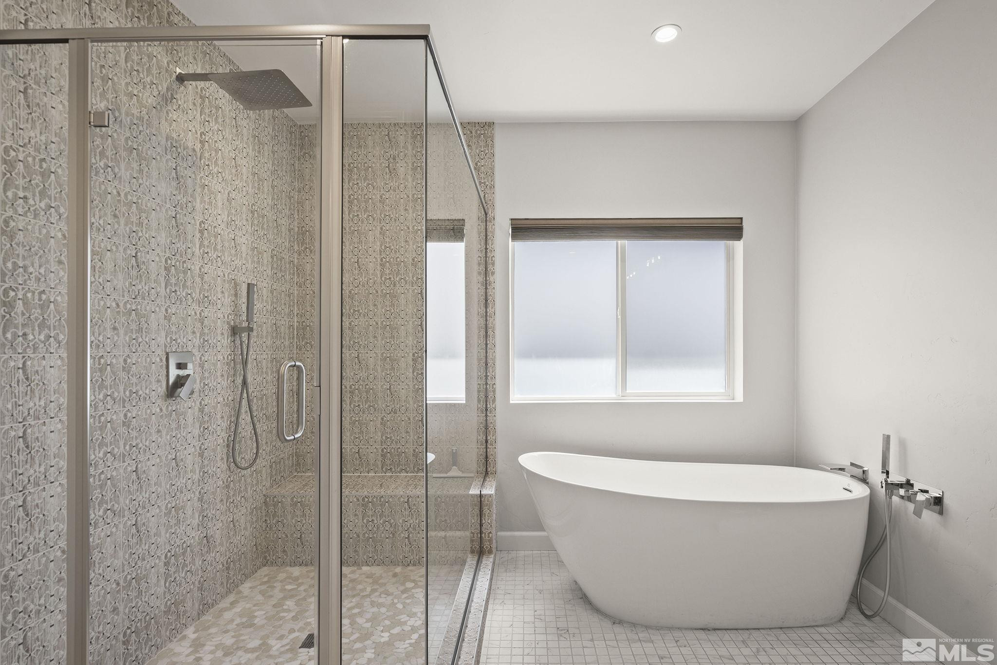 3880 Royer Court Reno, NV 89509 - Photo 15 of 29 a bathroom with a bathtub and shower