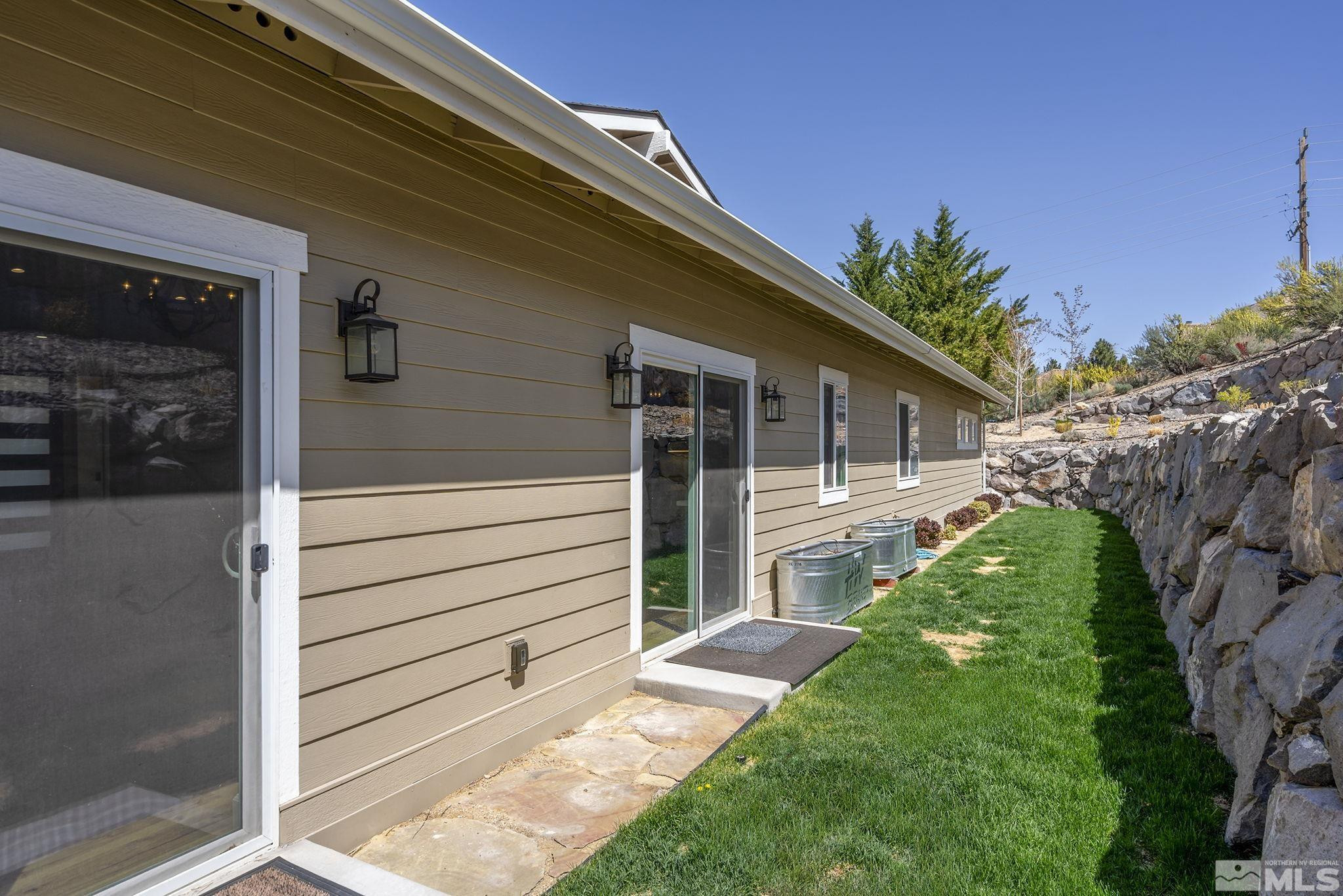 3880 Royer Court Reno, NV 89509 - Photo 22 of 29 a view of a house with a yard