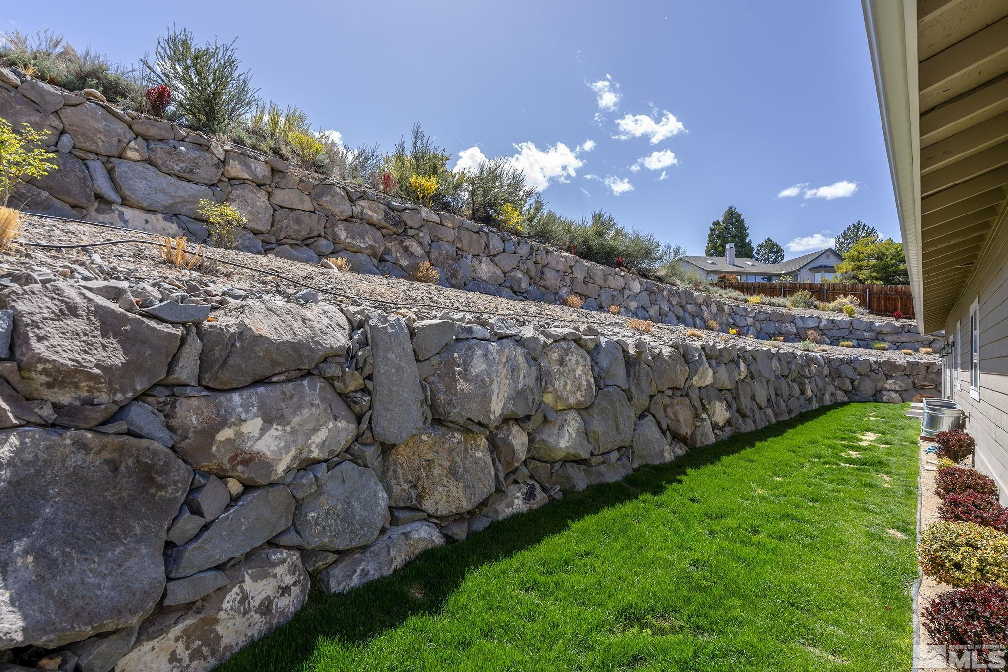 3880 Royer Court Reno, NV 89509 - Photo 23 of 29 a view of a pathway of a building with a yard