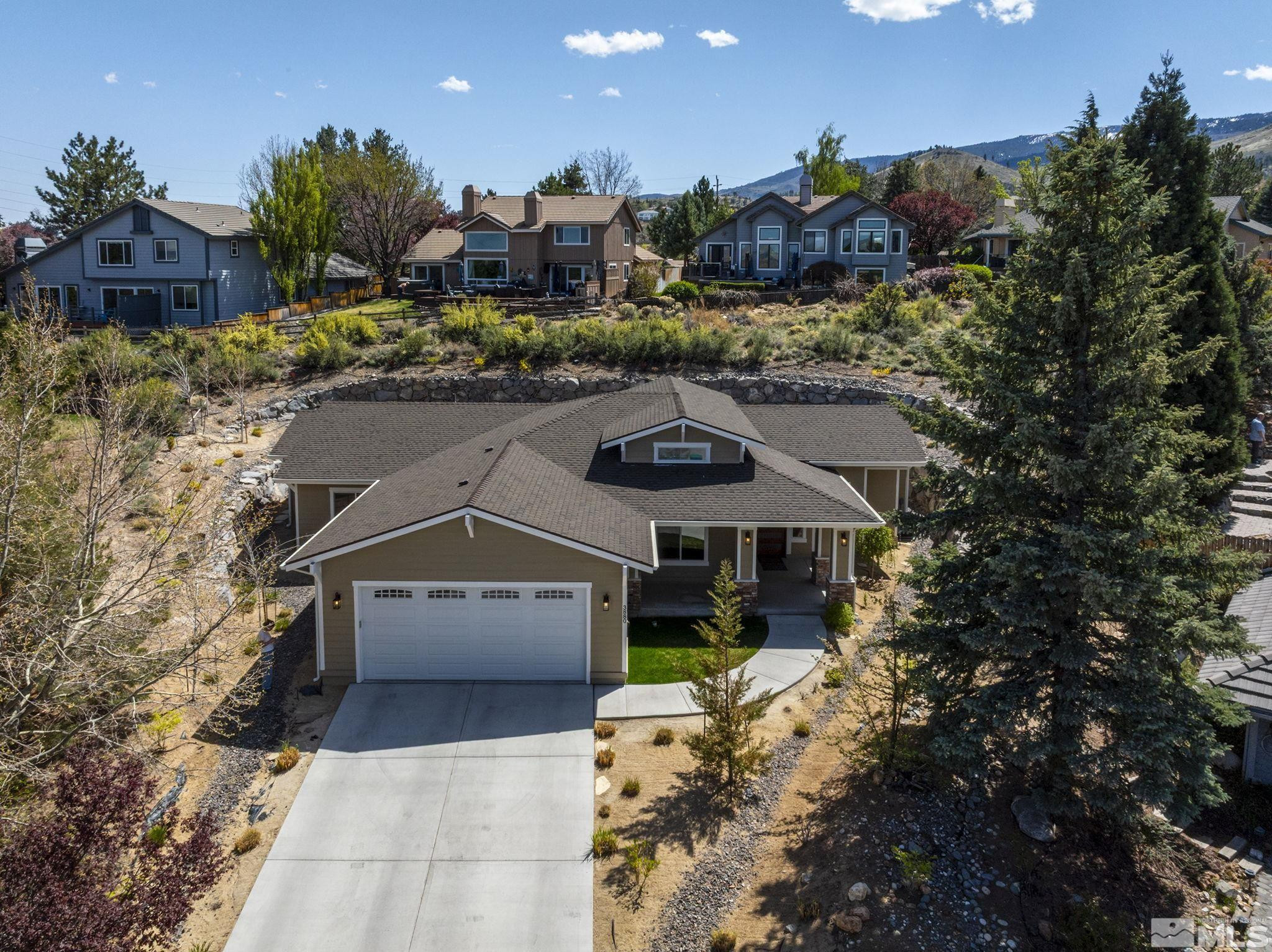 3880 Royer Court Reno, NV 89509 - Photo 3 of 29 a view of house with a yard and outdoor seating