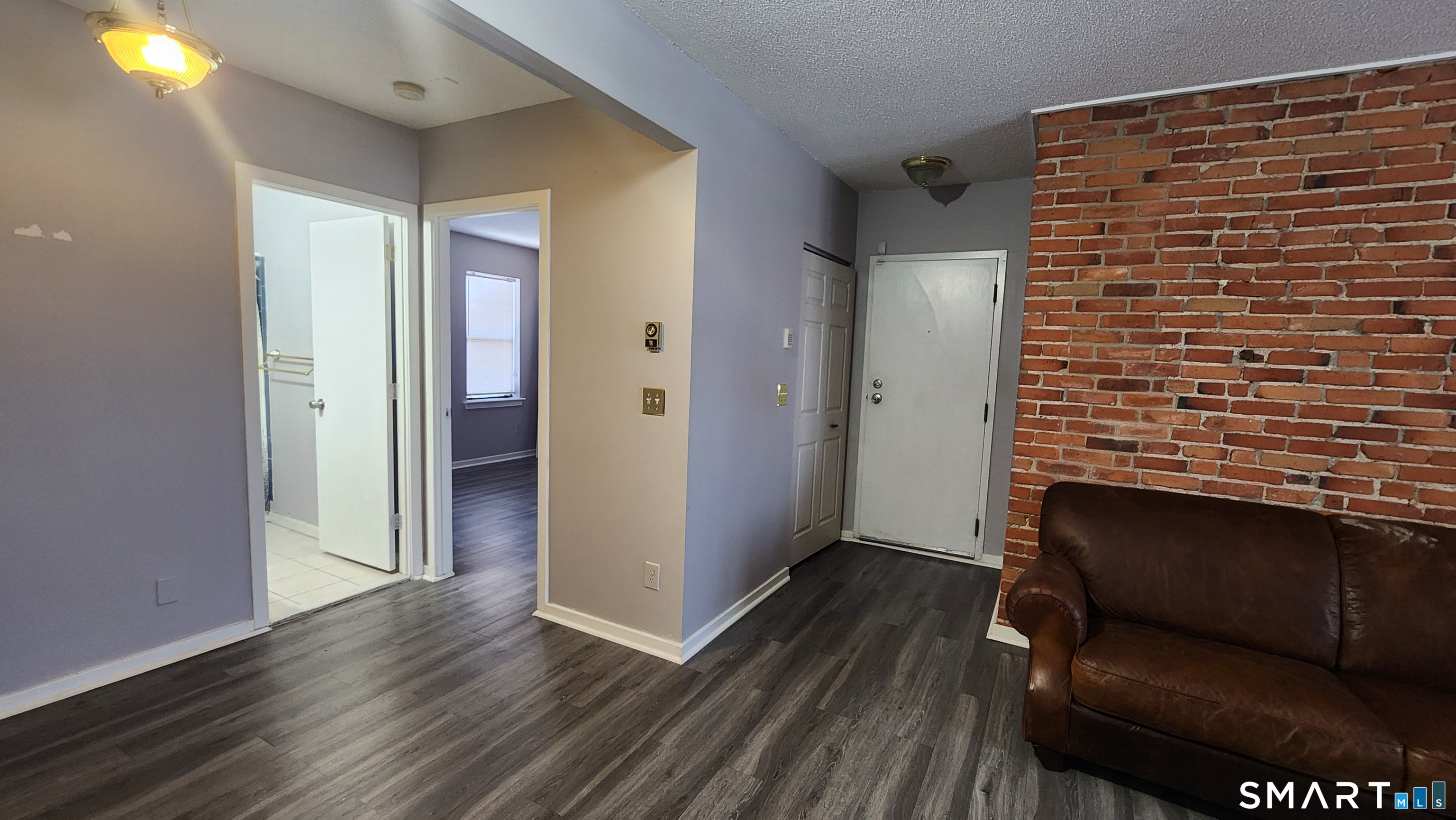 18 Townley Street, Unit D3 Hartford, CT 06105 - Photo 3 of 10 a view of livingroom with hardwood floor and hallway