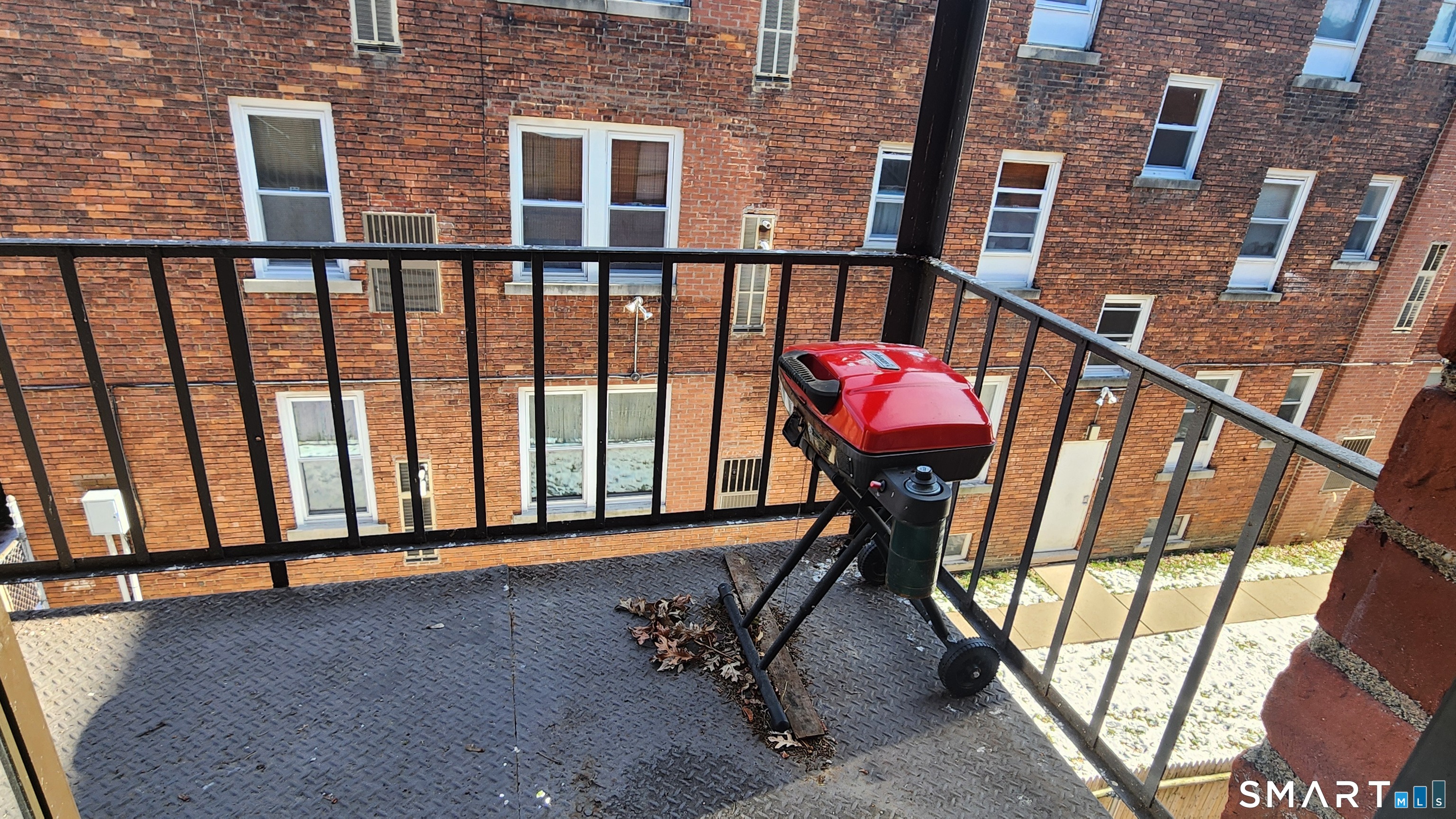 18 Townley Street, Unit D3 Hartford, CT 06105 - Photo 9 of 10 a view of a balcony with furniture