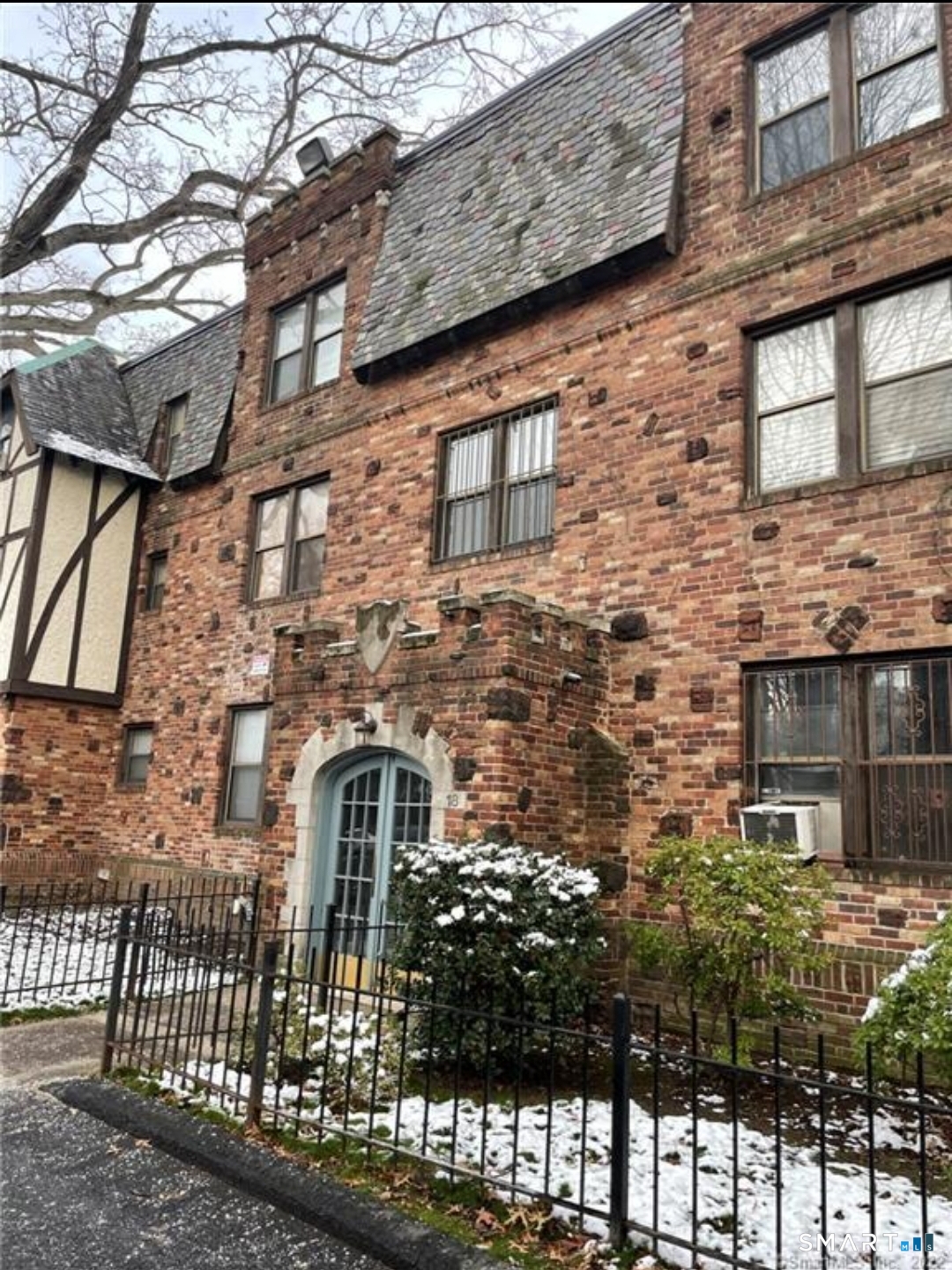 18 Townley Street, Unit D3 Hartford, CT 06105 - Photo 10 of 10 a front view of a house with a yard
