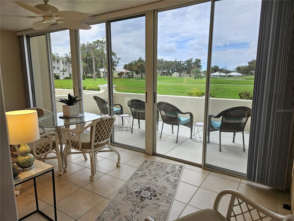 435 Cerromar Lane, Unit 329 Venice, FL 34293 - Photo 12 of 57 a view of a city from a dining room with furniture window and outside view