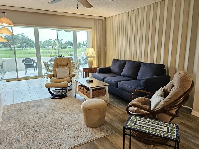 a bedroom with a bed and flat screen tv