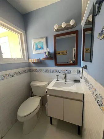 a bathroom with a toilet and shower