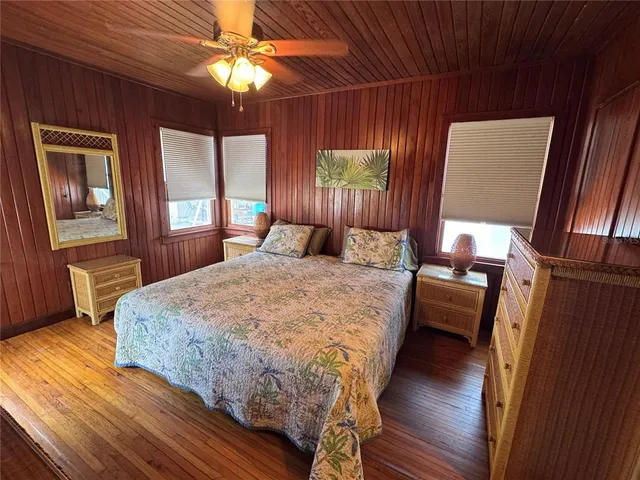 a bathroom with a toilet a sink and a mirror