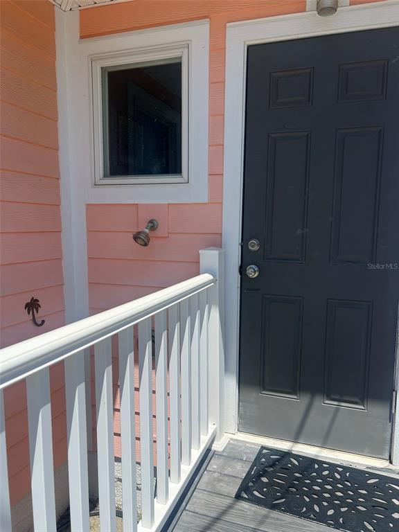 5 82nd Avenue Treasure Island, FL 33706 - Photo 10 of 35 a bathroom with a sink and a mirror
