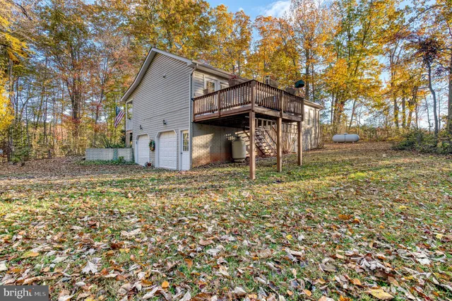 a house view with a backyard space
