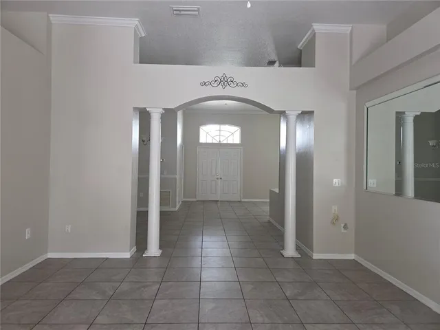 a view of a hallway with entryway