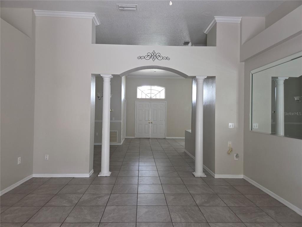 4511 Oak River Circle Valrico, FL 33596 - Photo 4 of 14 a view of a hallway with entryway