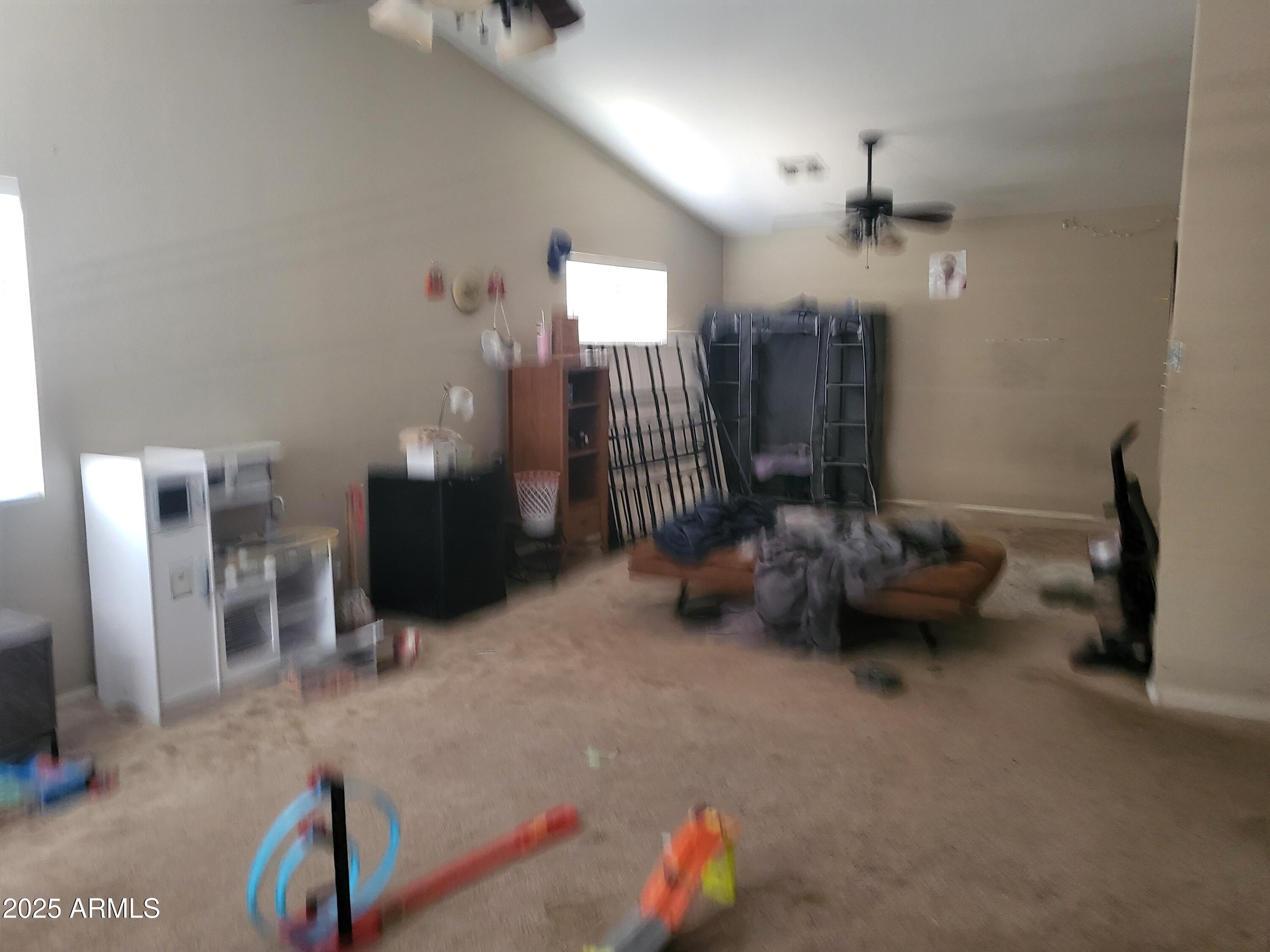 43718 West Magnolia Road Maricopa, AZ 85138 - Photo 13 of 21 a living room with furniture and wooden floor