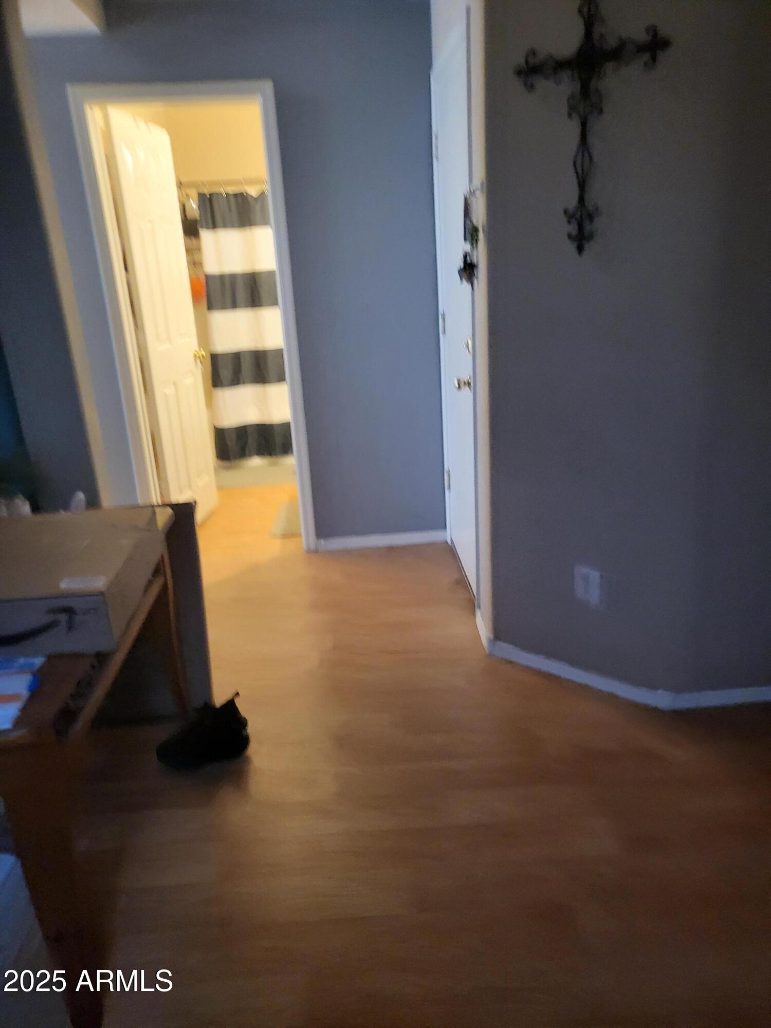 43718 West Magnolia Road Maricopa, AZ 85138 - Photo 6 of 21 a view of an empty room with a window