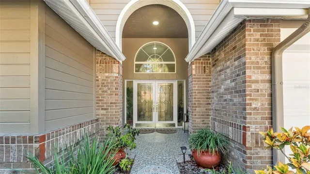 a bedroom with a bed and a desk
