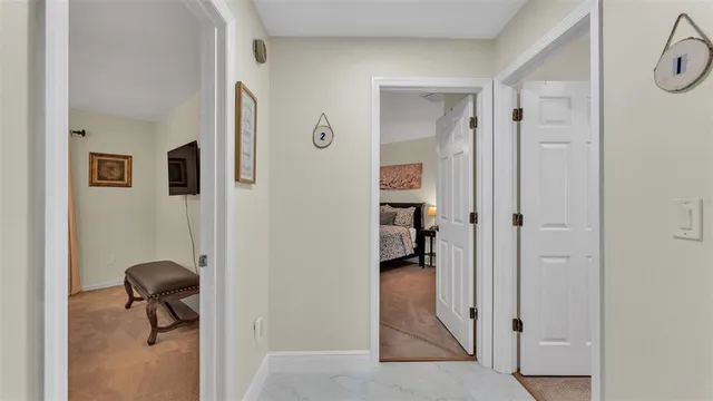 a kitchen with stainless steel appliances granite countertop cabinets and a refrigerator