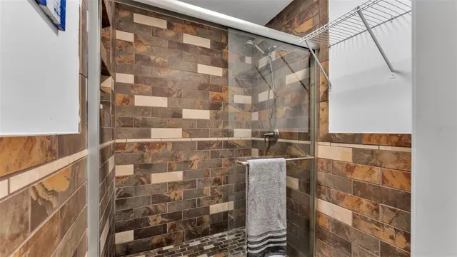 a kitchen with stainless steel appliances granite countertop a stove sink and cabinets