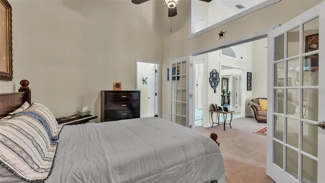 a bed room with a bed and a couch