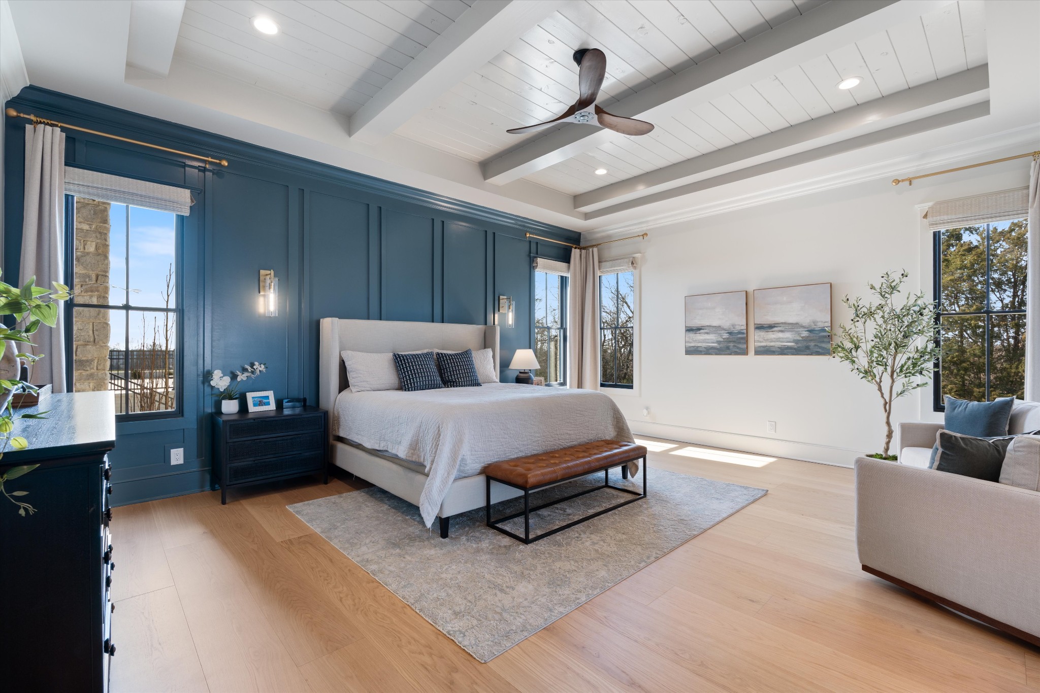 2996 South Rutland Road Mount Juliet, TN 37122 - Photo 25 of 89 a bedroom with a large bed and a chandelier