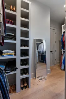 a large kitchen with a lot of counter space and a sink