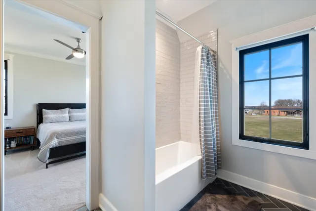 a view of a studio with wooden floor