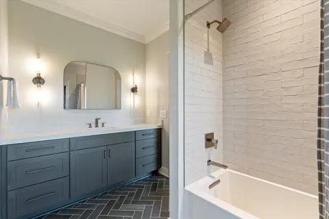 an aerial view of a house with garden space and street view