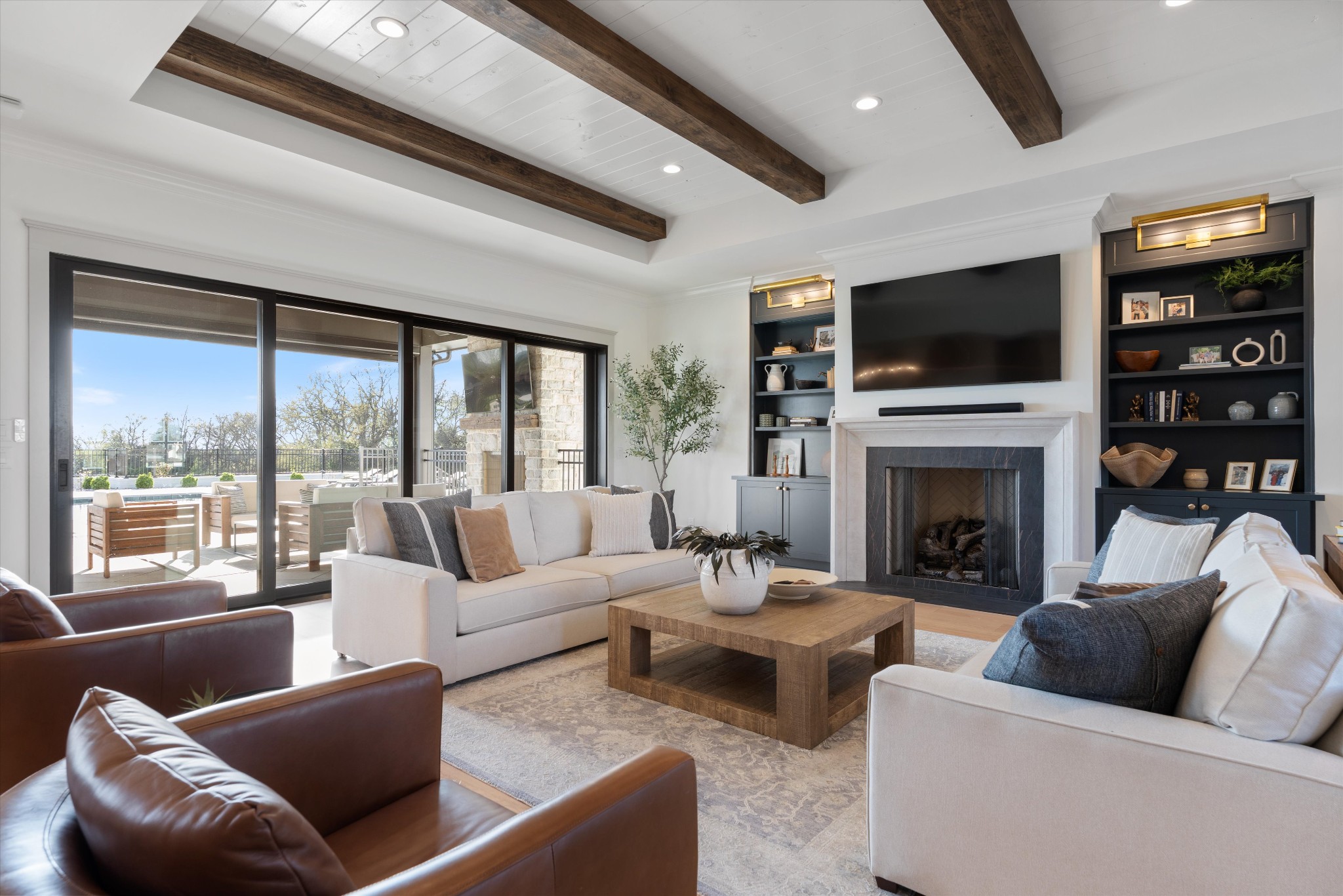 2996 South Rutland Road Mount Juliet, TN 37122 - Photo 10 of 89 a living room with furniture a fireplace and a flat screen tv