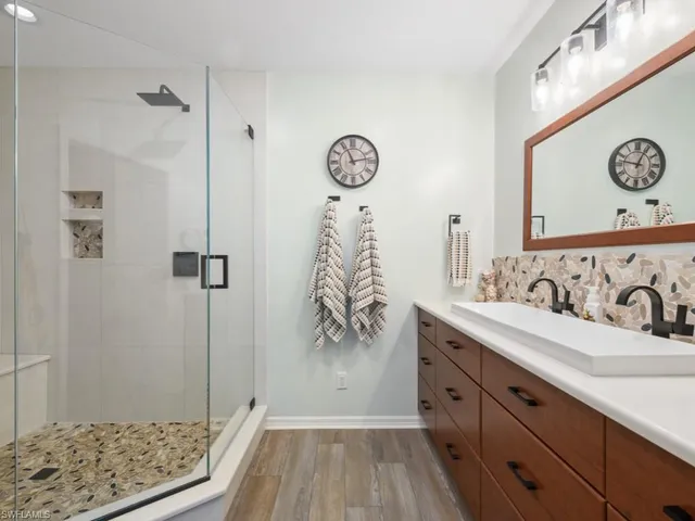 $625,000 | 5620 Whisperwood Boulevard, Unit 1203, Naples, FL 34110