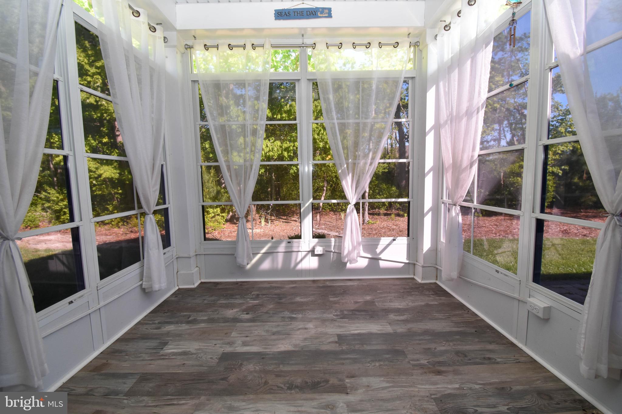 36611 Red Cedar Loop, Unit 19 Ocean View, DE 19970 - Photo 24 of 35 Sunroom