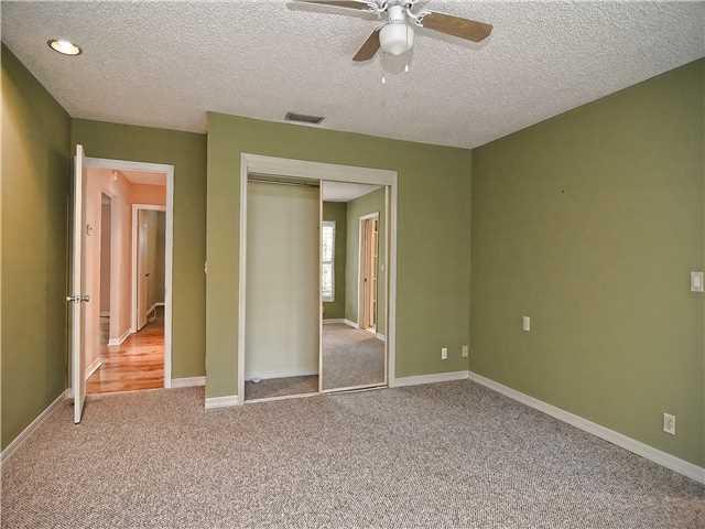 13 Palm Road Sewall's Point, FL 34996 - Photo 17 of 25 a view of an empty room with a chandelier fan