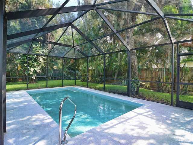 13 Palm Road Sewall's Point, FL 34996 - Photo 2 of 25 a view of a backyard